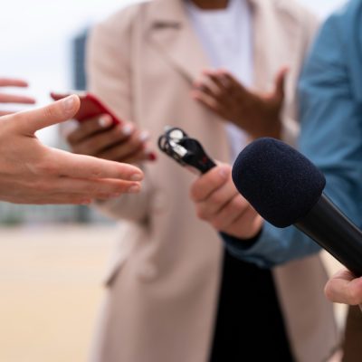 people-taking-interview-outdoors